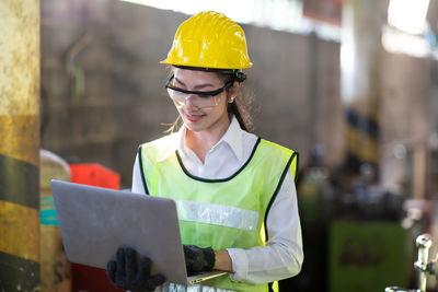 Woman working with mobile phone