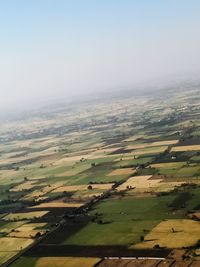 Scenic view of landscape against cloudy sky