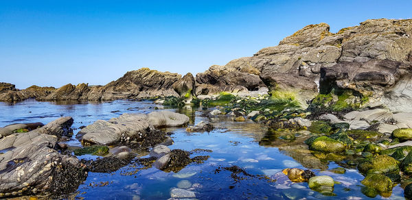 Rock formations against blue sky