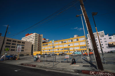 Construction site against buildings in city