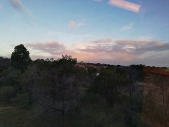 Scenic view of landscape against sky during sunset