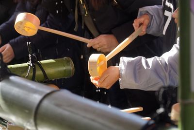 Midsection of man working at factory