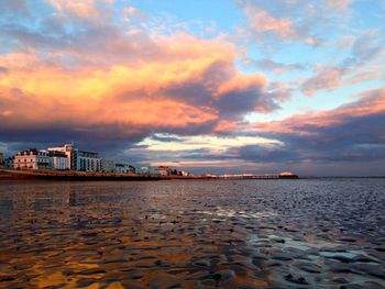 Scenic view of sea against cloudy sky