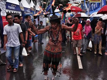 People dancing in city