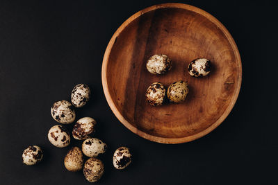 High angle view of food on table against black background