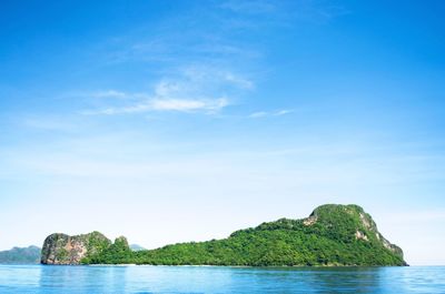 Scenic view of calm sea against cloudy sky