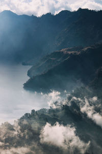 Low angle view of majestic mountains against sky