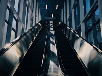 Low angle view of escalator in building