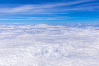 Aerial view of clouds against blue sky