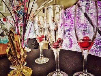 Close-up of multi colored umbrellas on table