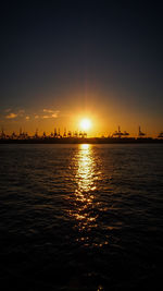 Scenic view of sunset over river