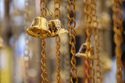 Close-up of chain swing hanging in store