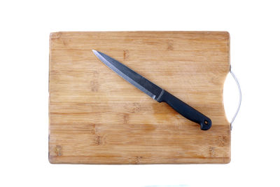 High angle view of wood on table against white background