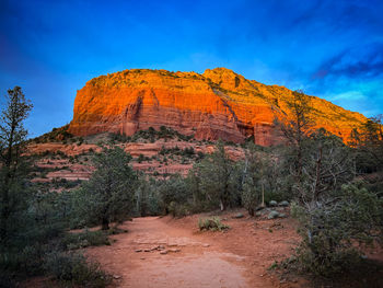 Red rocks mountain lit up at sunset in sedona, arizona