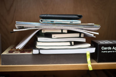 Stack on books on shelf