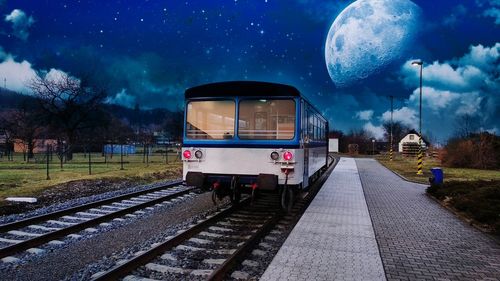 Train on railroad track at night