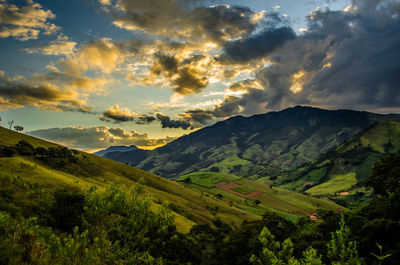 Scenic view of landscape against sky during sunset