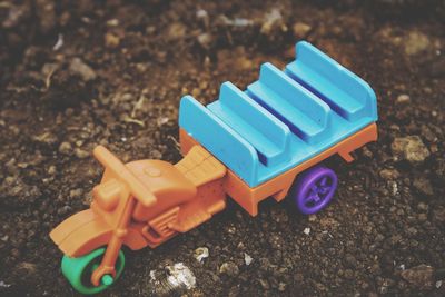 High angle view of toys on field