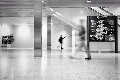 View of people walking in corridor