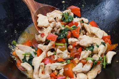 High angle view of chopped vegetables in cooking pan