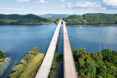 Ariel view of traffic on a bridge crossing the tennessee river in scottsboro alabama