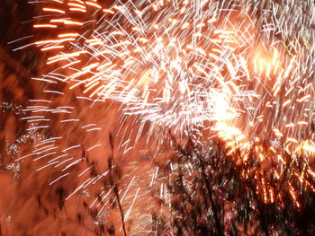Firework display at night