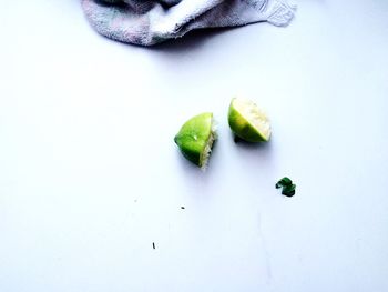 Close-up of fruit over white background