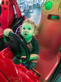 Cute boy in amusement park