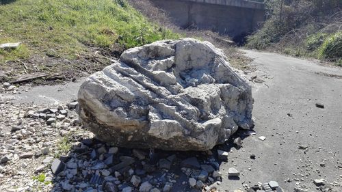 Close-up of pebbles on sand