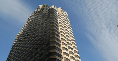 Low angle view of modern building against sky