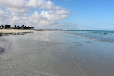 Scenic view of beach against sky