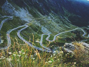 High angle view of winding road on land