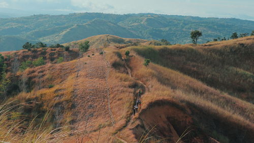 Scenic view of land against sky