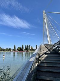 Bridge over river against sky