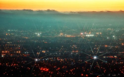 Aerial view of city at night