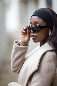 Young woman wearing sunglasses