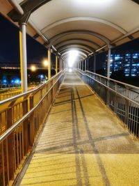 Empty footbridge at night
