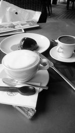 Close-up of coffee cup on table