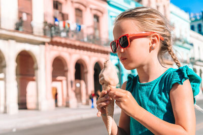 Young woman wearing sunglasses outdoors