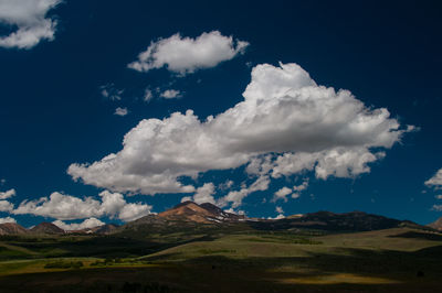 Panoramic view of landscape against cloudy sky