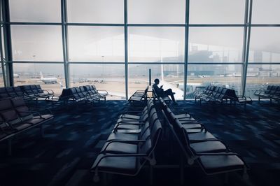 People sitting on chair at airport