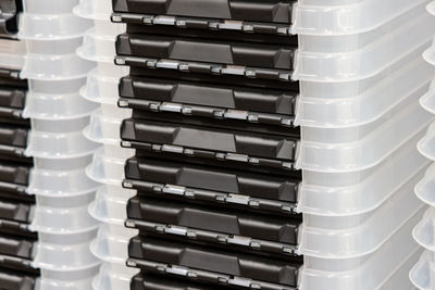 Close-up of stack of plastic containers