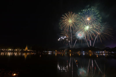 Firework display at night