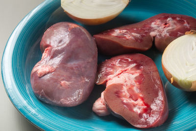 High angle view of meat in plate on table