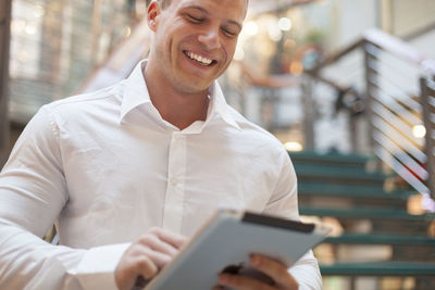 Young man using mobile phone