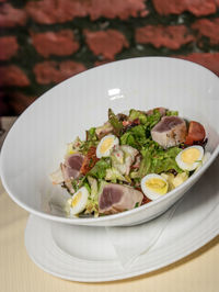 Close-up of salad in bowl on table