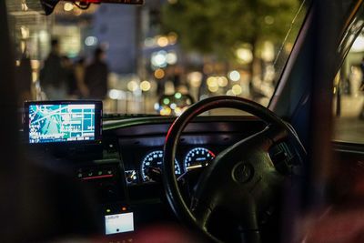 Close-up of mobile phone in car