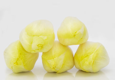 Close-up of fruits against white background