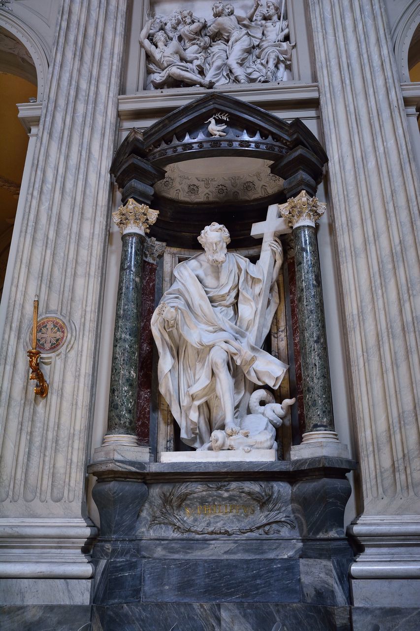 LOW ANGLE VIEW OF ANGEL STATUE IN TEMPLE