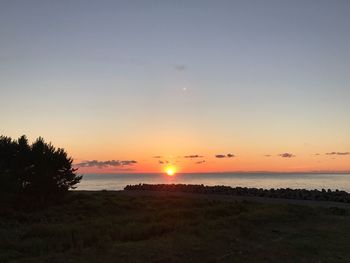 Scenic view of sunset over sea